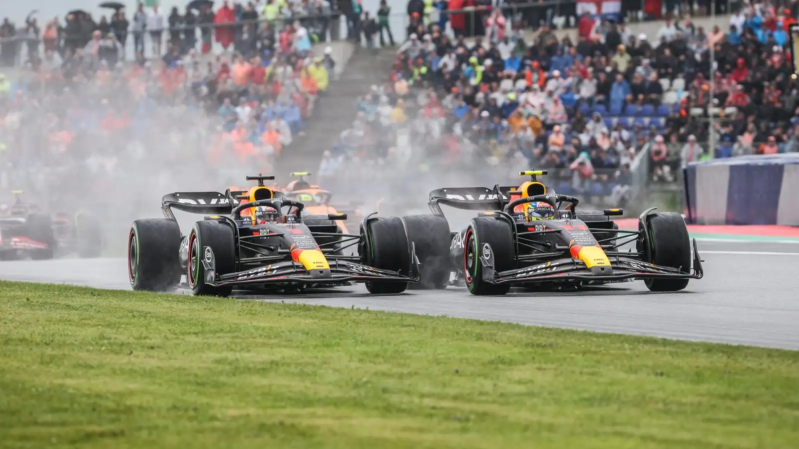 A driver in a Formula One car during a race